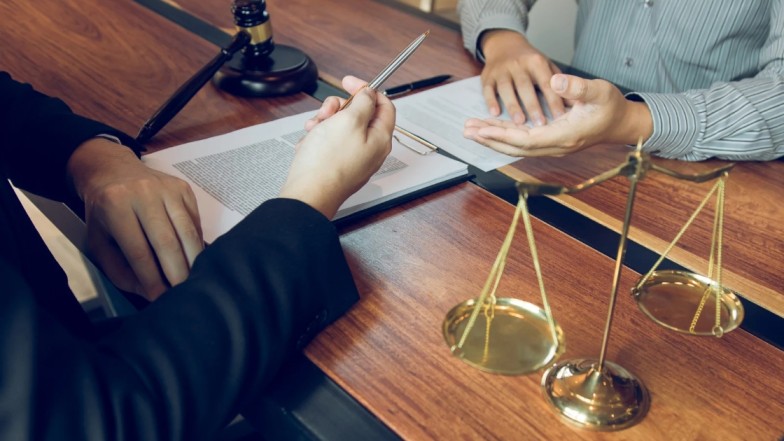 Truck accident attorney in Houston discussing negligence law with client