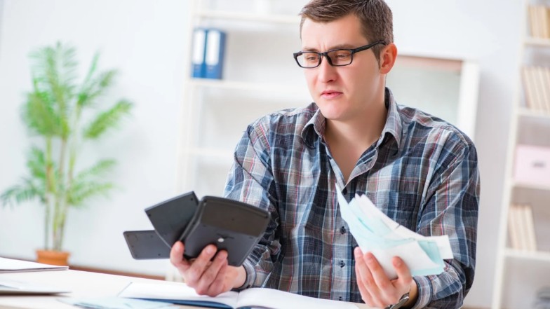 Car accident victim stressed with insurance claim documents without attorney help