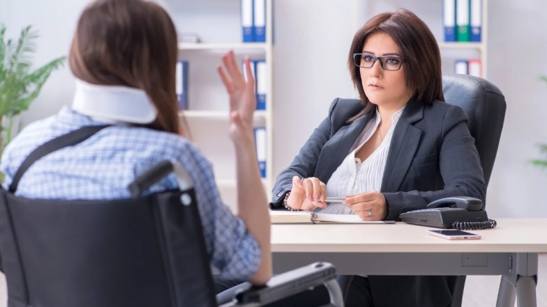 Car accident attorney guiding injured client for accident claim.
