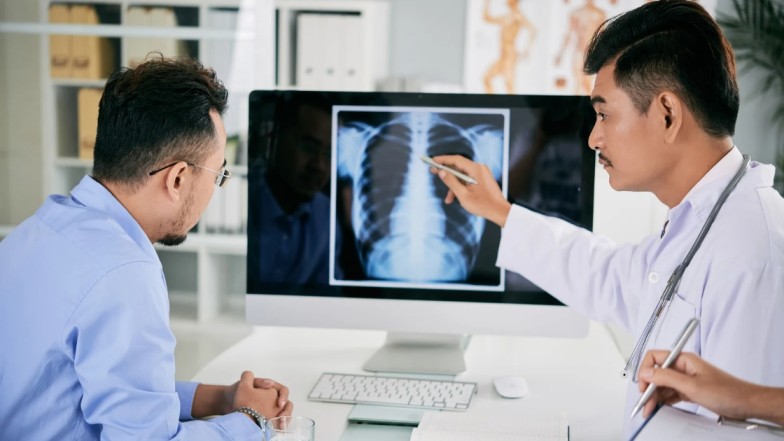 Doctor showing medical report to patient for soft tissue injury