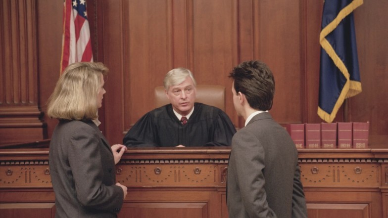 Car accident attorney presenting strong defense in courtroom