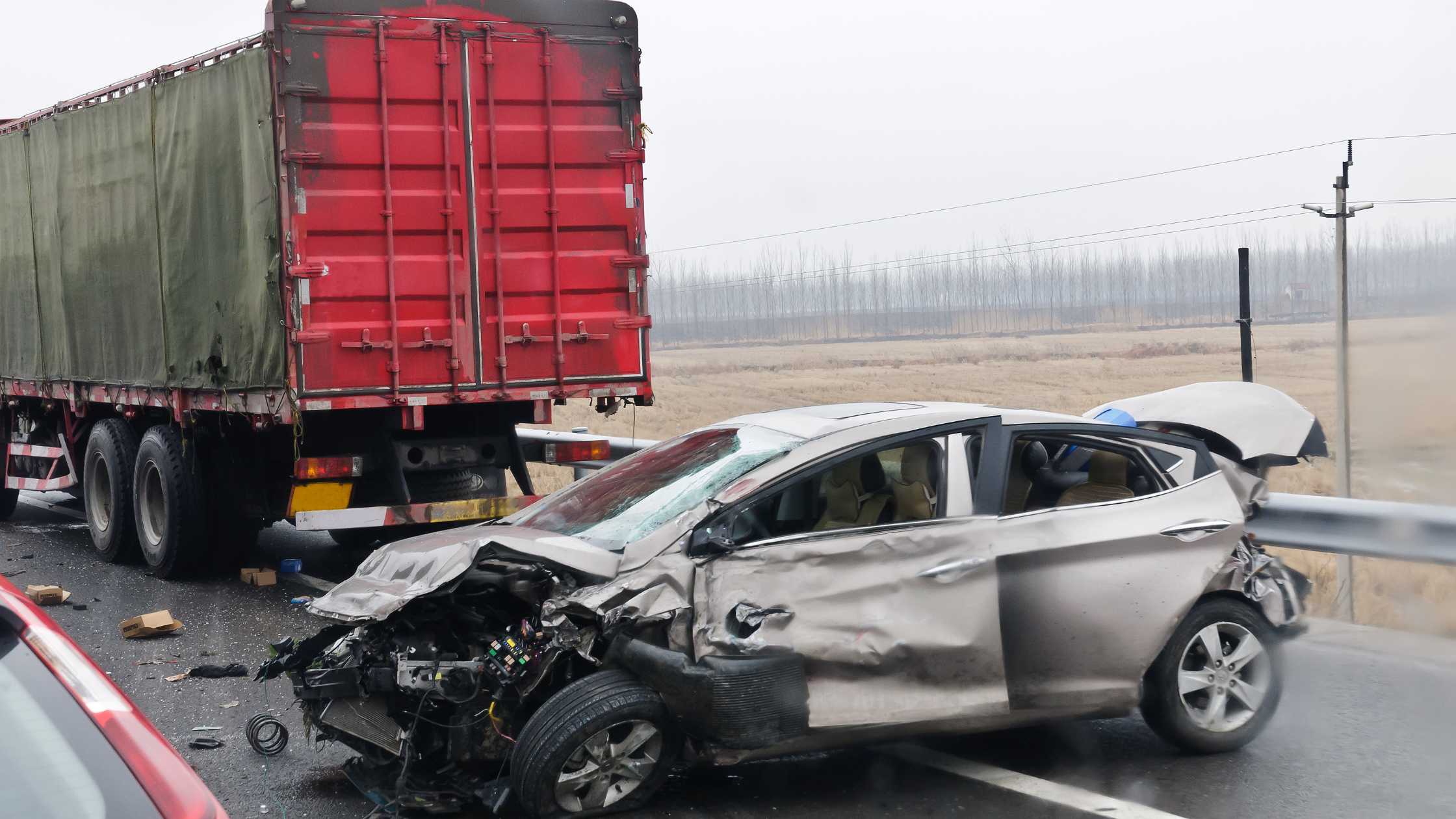 white color car accident with truck