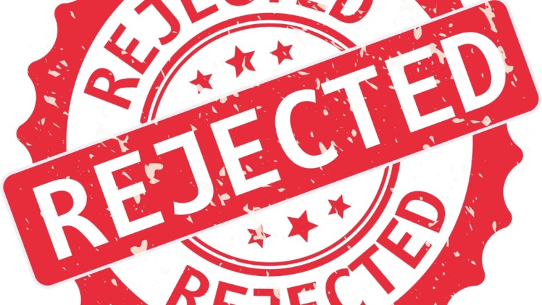 Insurance claim form with denied stamp due to truck accident