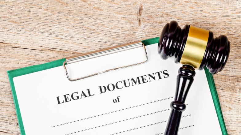 Personal injury lawyer reviewing medical records and accident evidence for case
