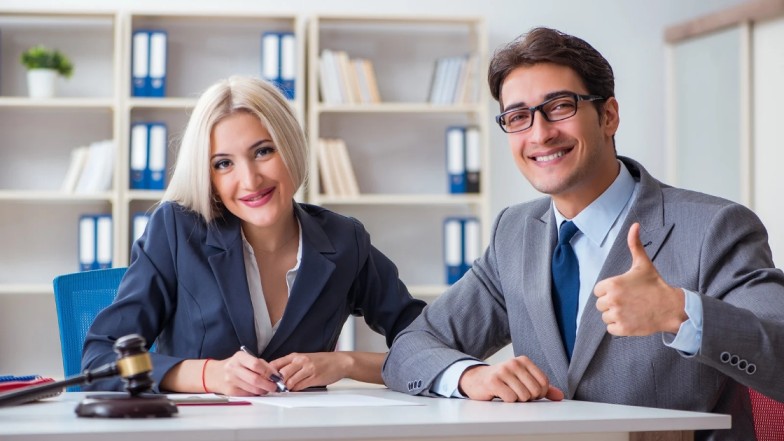 Car accident lawyer in Austin shaking hands with client after consultation
