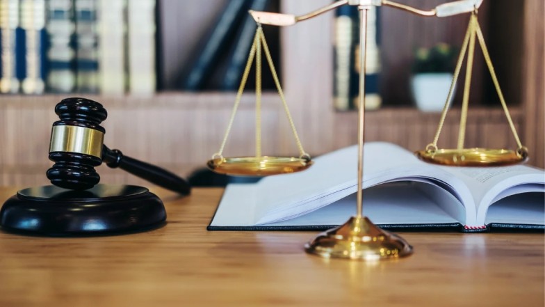 Compensation in Austin car accident cases shown with justice scales, money, and medical records