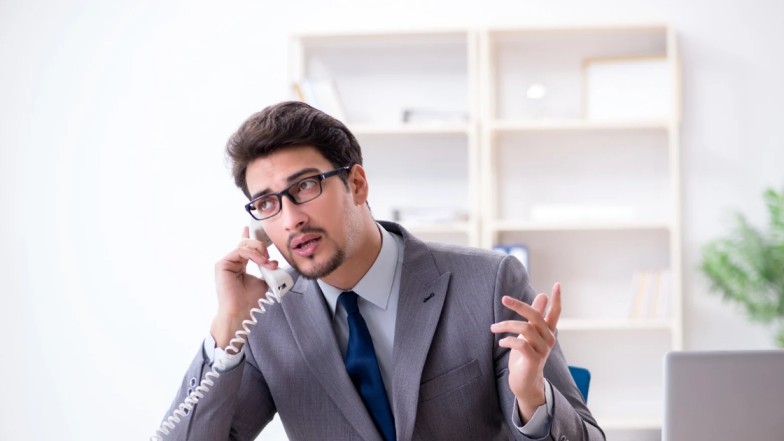 Accident victim discussing insurance settlement issues with agent in New York