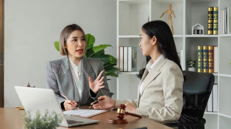 Personal injury attorney fees explained with legal documents and justice scales.