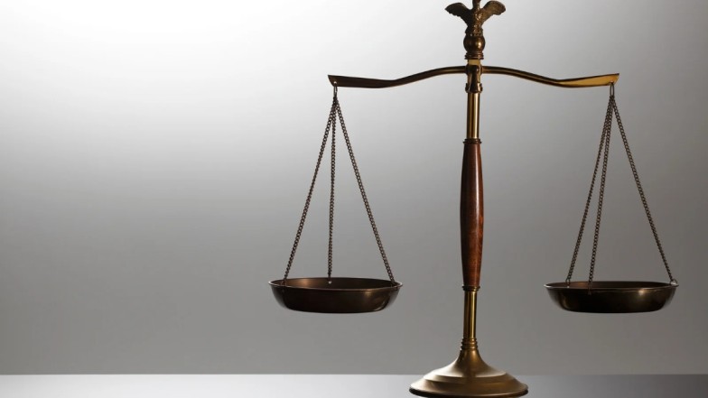 Factors that affect personal injury lawyer fees illustrated on balance scale