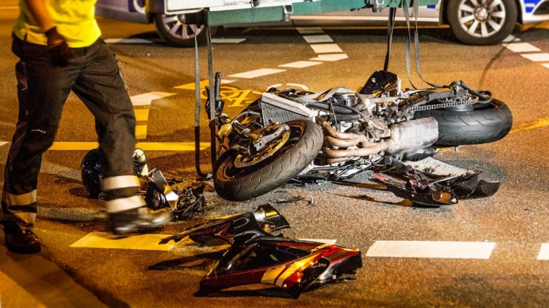 Motorcycle accident scene in New York City traffic