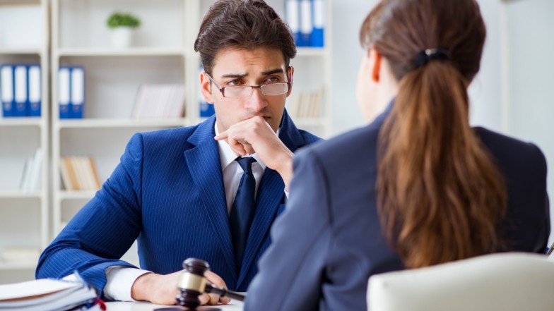 Person contacting a criminal defense lawyer in New York immediately after being charged